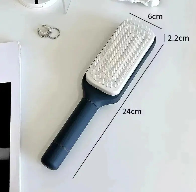 White and black detangling hair brush